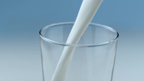 Milk pouring and splashing in slow motion; shot on Phantom Flex 4K at 1000 fps alt