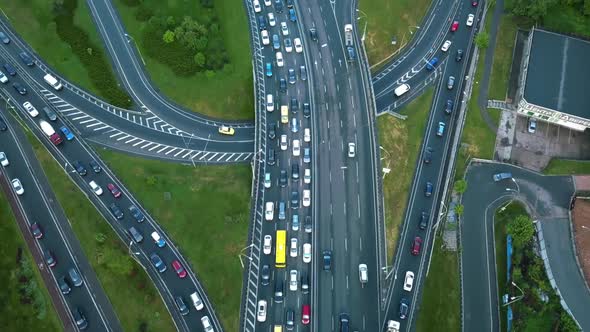 Aerial View of Loaded Cars with Traffic Jam at Rush Hour on Highway with Bridge