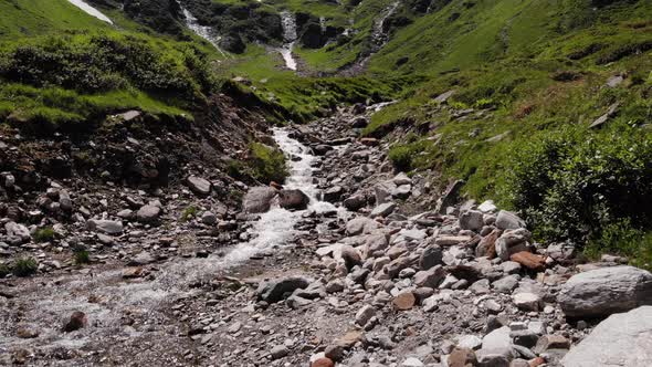 Freshwater Flowing On Rocks From The Valley Of Hohe Tauern In Stausee Wasserfallboden Reservoir, Kap