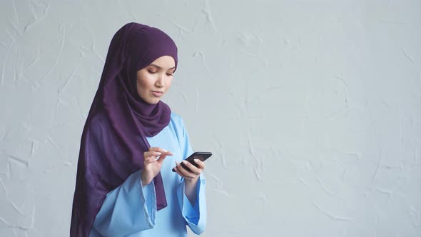 Young Muslim Woman Is Chatting with Her Friends.