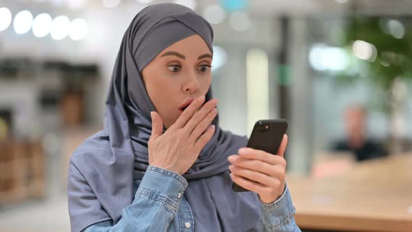 Arab Woman Reacting to Failure on Smartphone