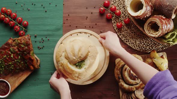 Putting Soup in Bread and Opening Top View