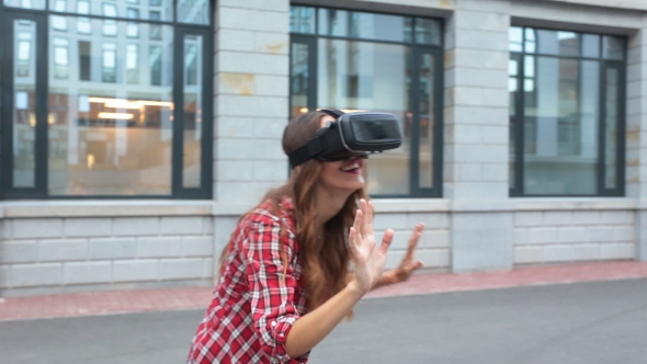 Woman Using a Virtual Reality Device
