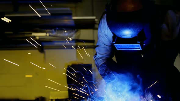 Welder welding a metal