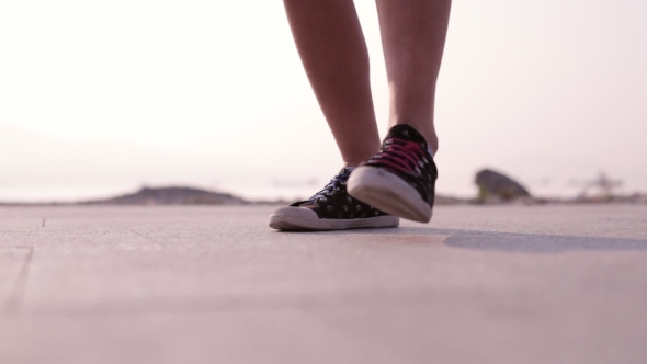  Shot Of Dancing Feet In Sneakers