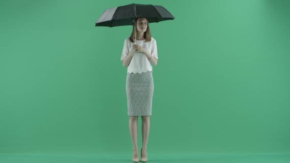 Young Woman Under Umbrella