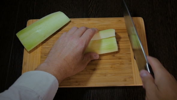 The Chef Is Cutting Zucchini, Cooking.