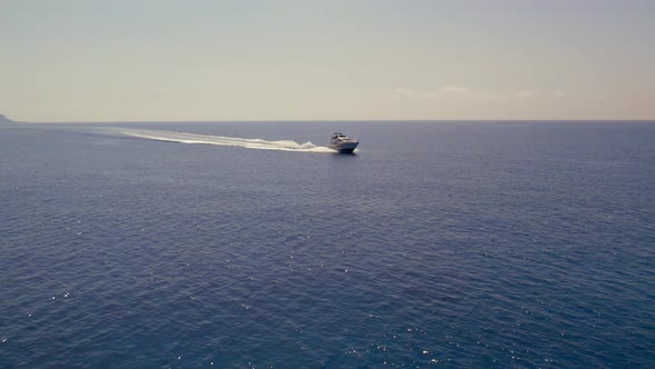 Drone Aerial Footage of Speedboat in the Blue Turquiose Mediterranean Sea in Cyprus Summer