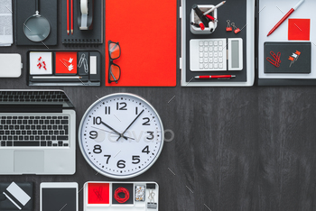 essories and a clock: business productivity and deadlines concept