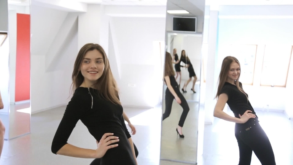 Young Models Work Out Technical Movements In Dance Classroom