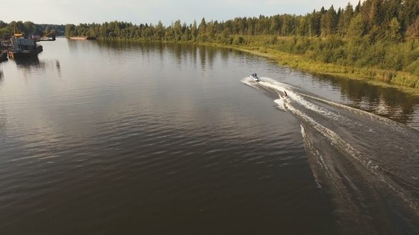 Wakeboarder Surfing On The river.Aerial Video.