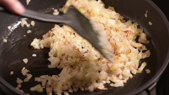 Frying Onions On Hot Pan