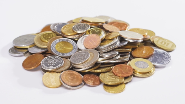 Many Old Different Coins Heap Rotating Over White