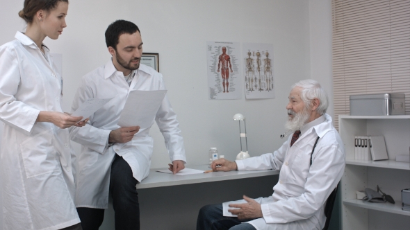 Young Interns Listen To The Words Of Experienced Doctor.