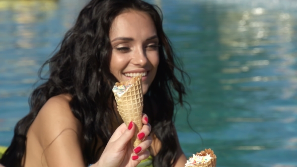 Friends Or Teenage Girl In Sunglasses Eating Ice Cream At The Pool. 20S.  