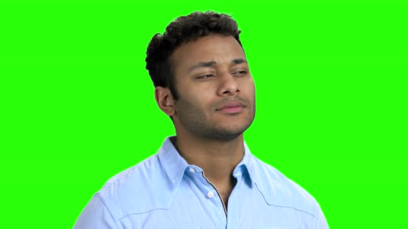 Happy Thoughtful Indian Guy on Green Screen