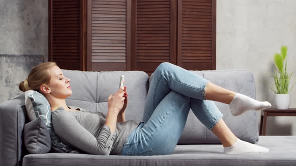 Young woman is resting at home