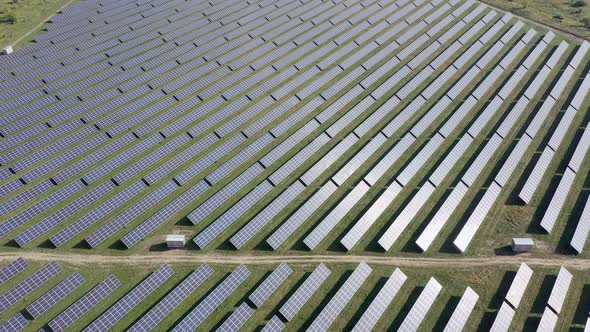 aerial view of solar power station, Aerial Top View of Solar Farm with Sunlight, Renewable Energy