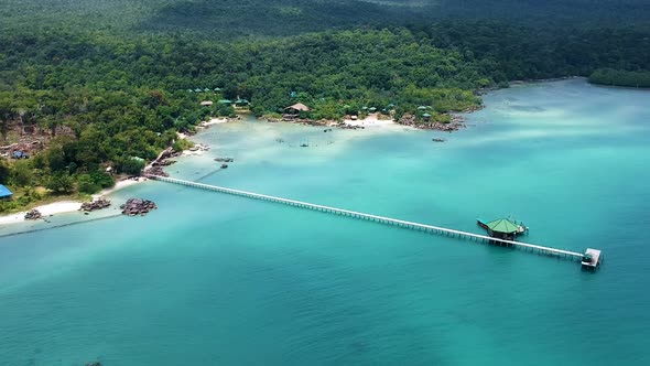 Aerial landscape of beach resort with long pier and turquoise blue sea. Koh Rong Sanloem, Cambodia