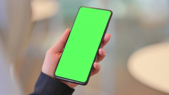 Arab Woman Watching Smartphone with Chroma Screen 