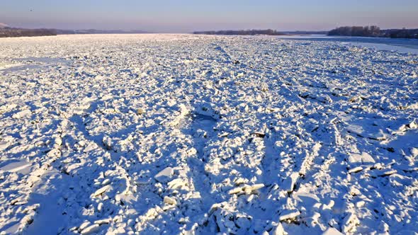 Ice jam on river at winter. Aerial view of Poland.