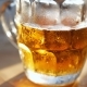 Beer In Glass On a Wooden Table - VideoHive Item for Sale