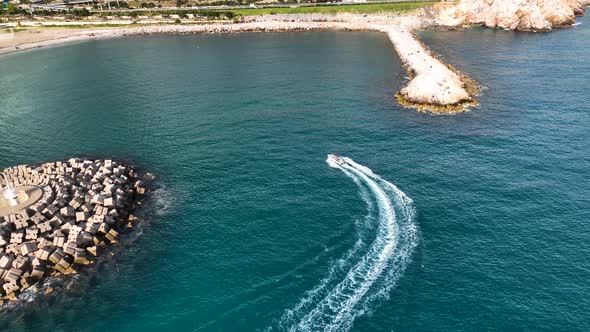 Yacht calls at the port aerial view 4 K