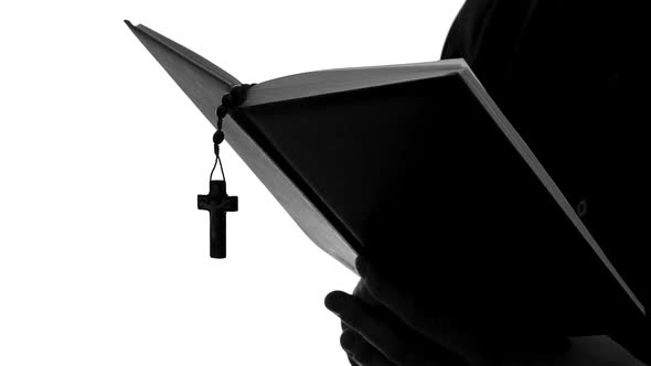 Priest Silhouette Reading Bible, Celebrating Mass, Religious Sect, Close Up