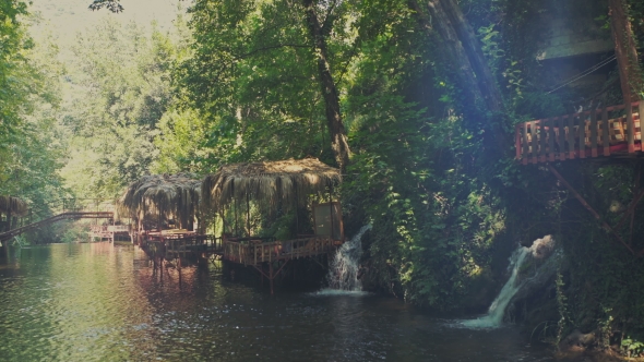 Summer Houses By The River With Waterfalls