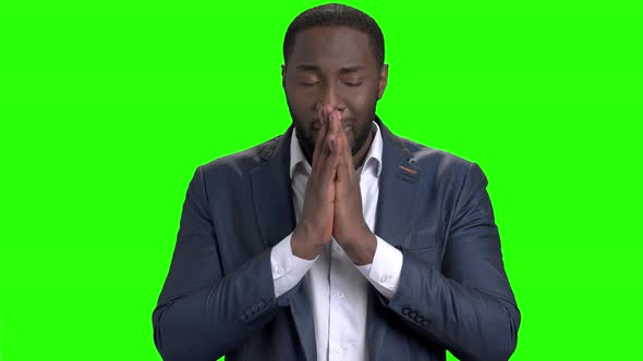 Depressed Afro-American Businessman on Green Screen.