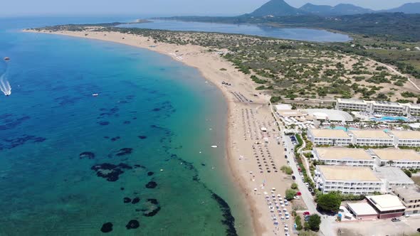 Aerial footage of the beautiful small town known as St George South, Greek city of Corfu Greece