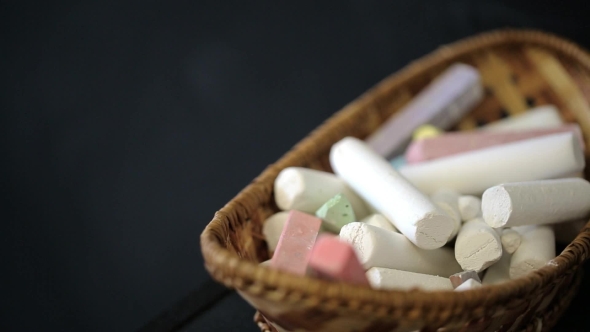 View Of Wicker Basket With Chalks And Crayons.