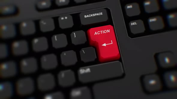 Action button on keyboard. A finger presses Enter. Click Action. Realistic keyboard button. Close Up