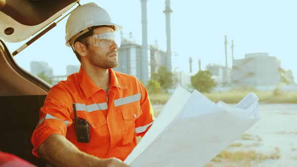 male caucasian engineer technician Industrial workers wearing safty uniform