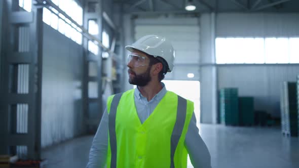 Portrait Storage Worker Walking at Export Supply Shipment Storehouse Checking