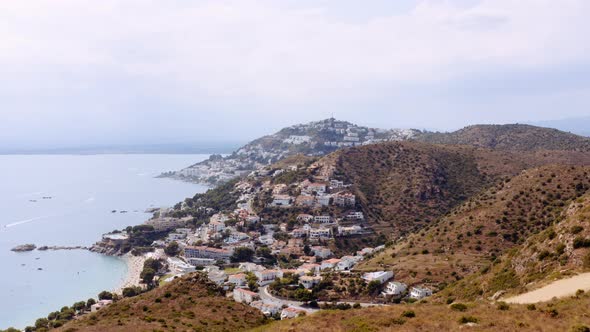 Aerial of Famous Coastal Mediterranean Town of Roses Spain