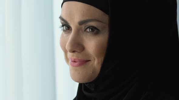 Cheerful Pretty Arab Female in Hijab Smiling, Female Wellness and Happiness