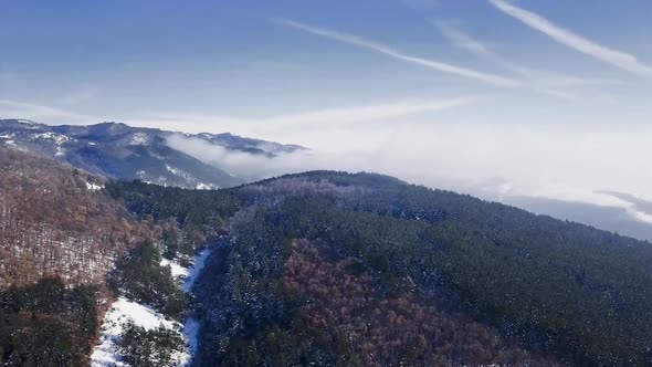 Fly over the mountain on a sunny day