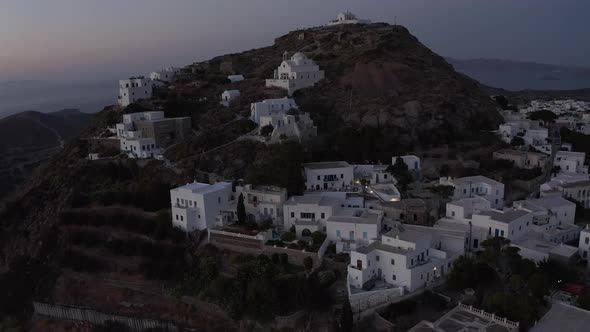 Little Village on a Mountain Site After Sunset with White Houses, Aerial View