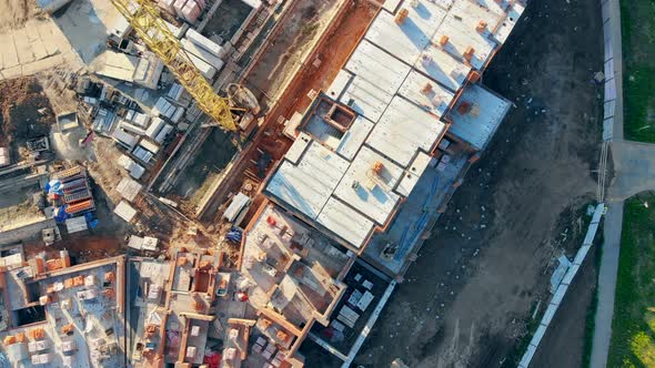 Unfinished Building and a Crane, Top View, Aerial.