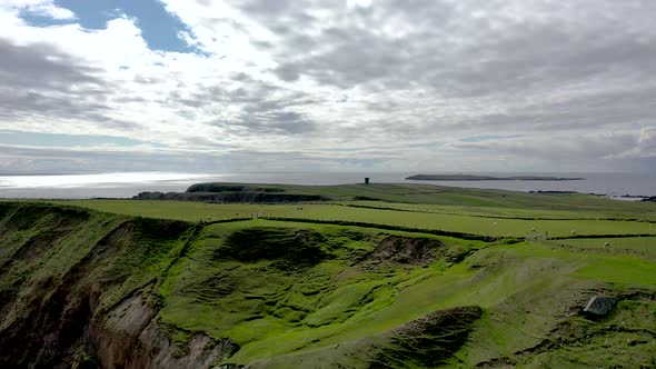 Aerial View of the Beautiful Coast at Malin Beg with Slieve League in the Background in County