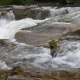 Strong Mountain Stream Flowing Over Rocks - VideoHive Item for Sale