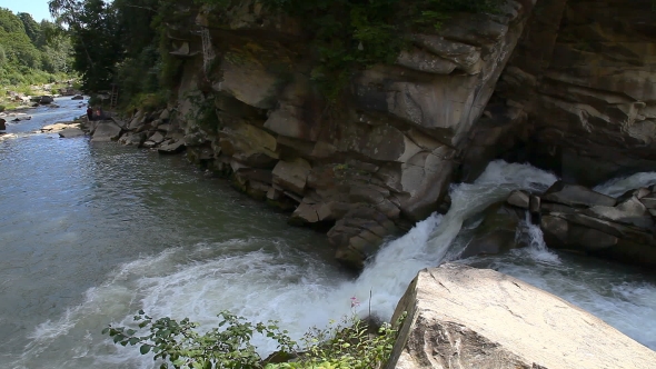 Strong Mountain Stream Flowing Over Rocks