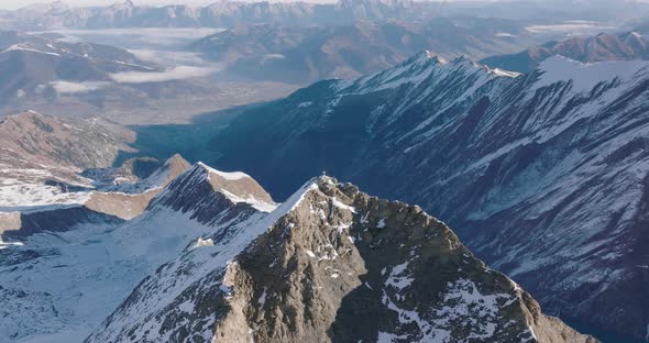 Drone Flight Toward Cross On Kitzsteinhorn Mountain Peak