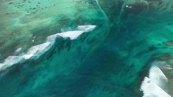 Beautiful Bird's-eye View of Mount Le Morne Brabant and the Waves of the Indian Ocean in Mauritius