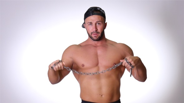 Handsome Man with Chain in Studio