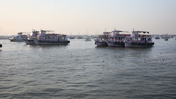 Tourist And Fisher Boats By The Harbour