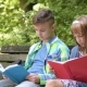 Boy And Girl Reading Book - VideoHive Item for Sale