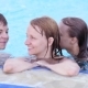 Happy Family Enjoying In Pool - VideoHive Item for Sale