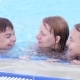 Happy Family Enjoying In Pool - VideoHive Item for Sale